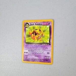 Pokemon Dark Kadabra Card - Yellow and Purple